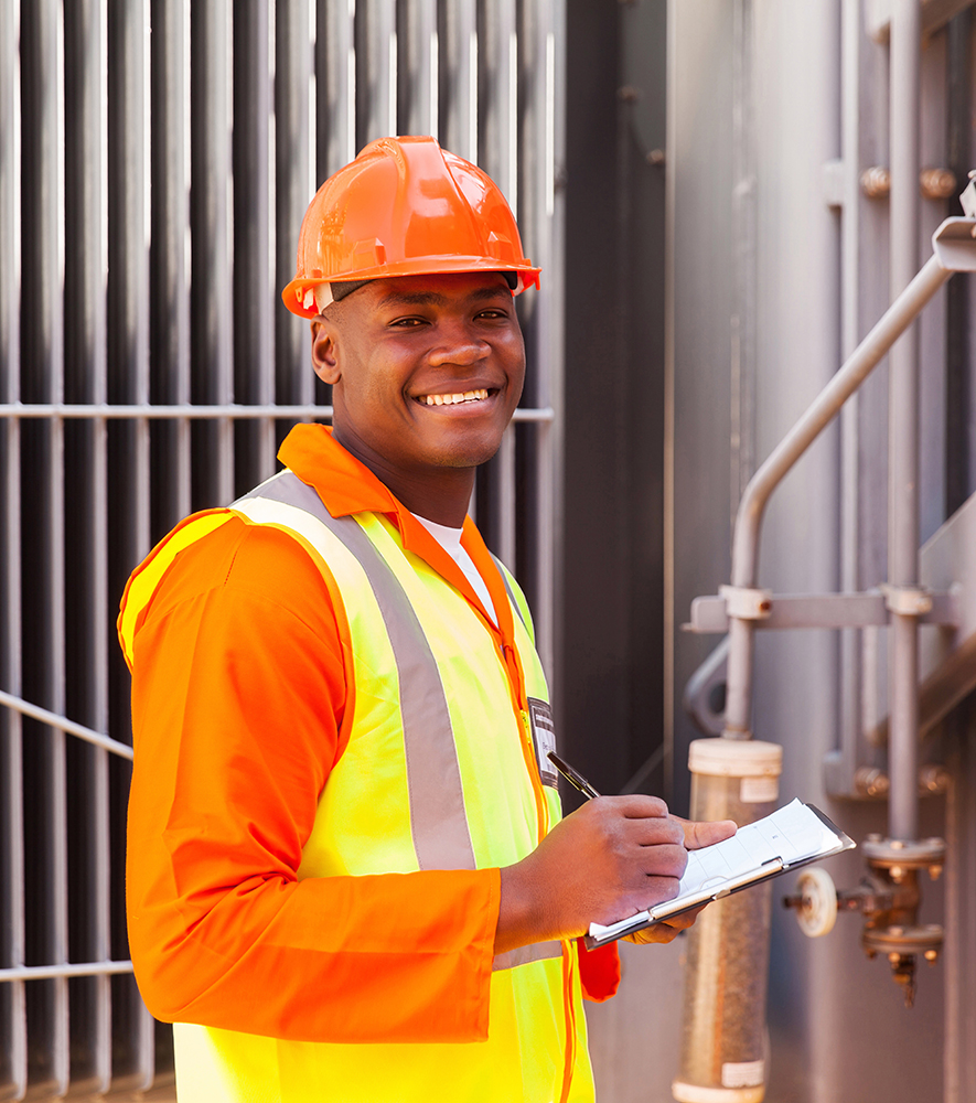 male african electrical worker in front of transformer